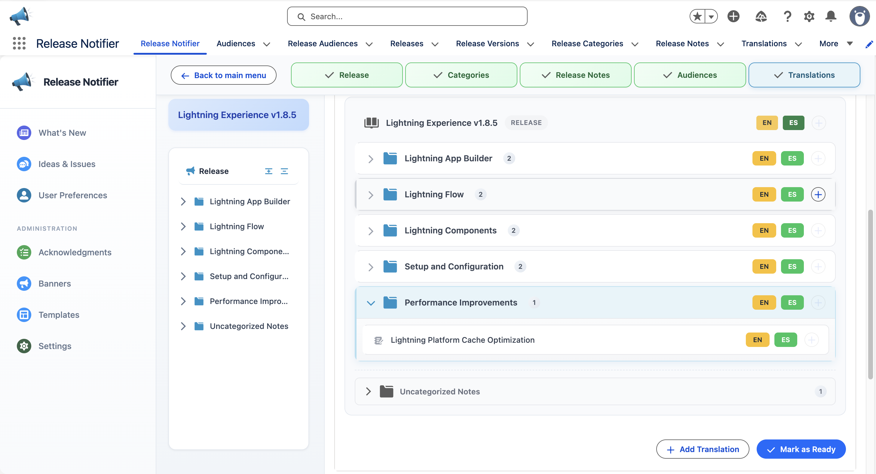 Release editor showing EN and ES translation badges per category